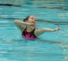 Waterdancer in the pool doing routine, aquago program