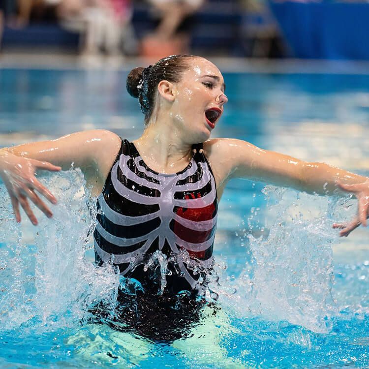 Ravensong Waterdancer doing routine in pool