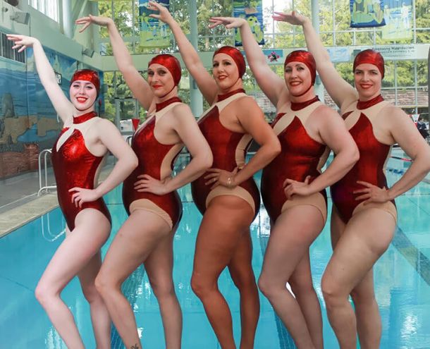 Photo of all Masters Waterdancers in red bathing suits