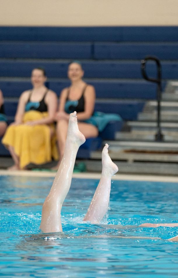Two waterdancers performing in pool, Solo Duets Program