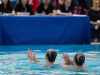 Two waterdancers performing in pool, Solo Duets Program