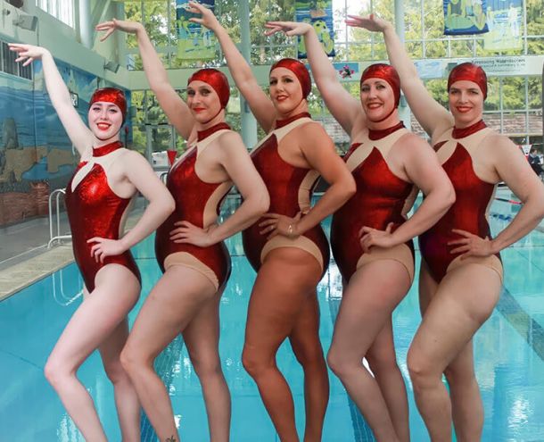 Photo of all Masters Waterdancers in red bathing suits