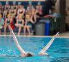 Two waterdancers performing in pool, Solo Duets Program