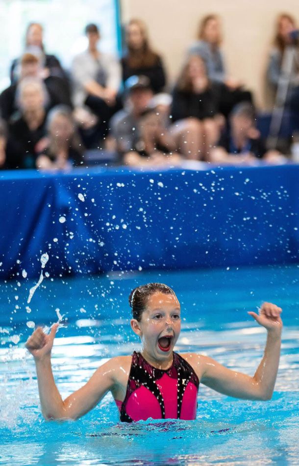 Waterdancer having fun in the pool with her artistic swimming routine, Lcomp program